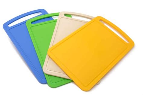 What are plastic cutting boards made of, and why do they sometimes smell like a science experiment gone wrong?